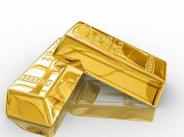 Золото слегка растет в цене на снижении доллара